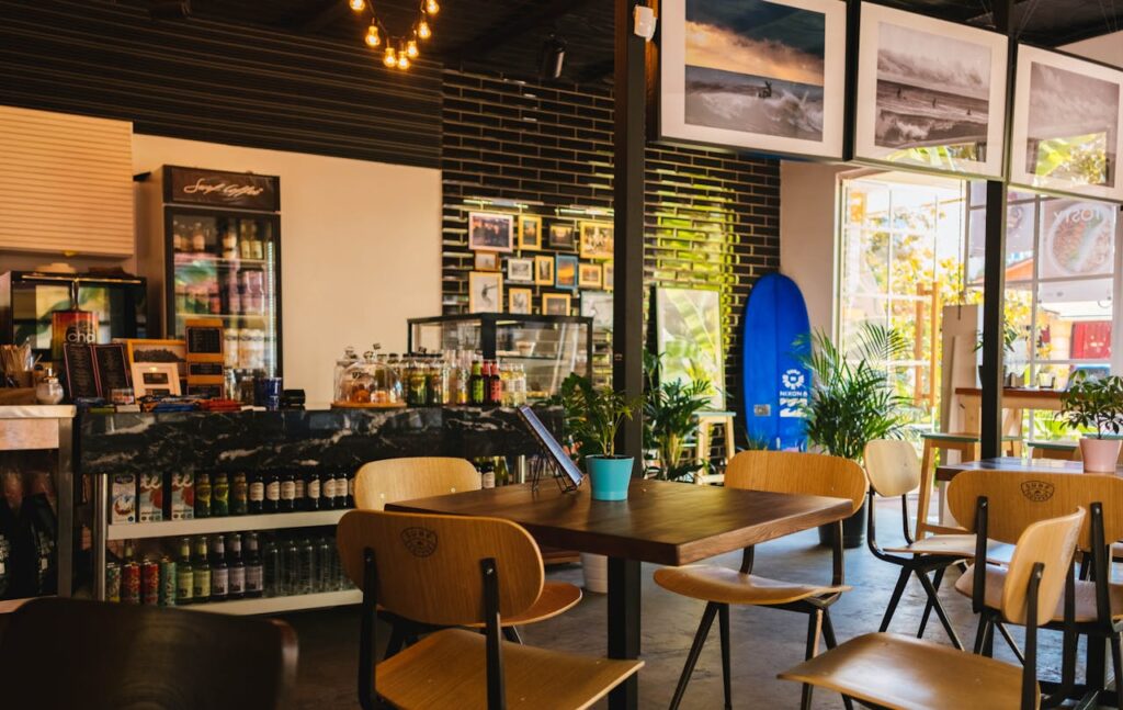 cafe with wooden chairs and tables