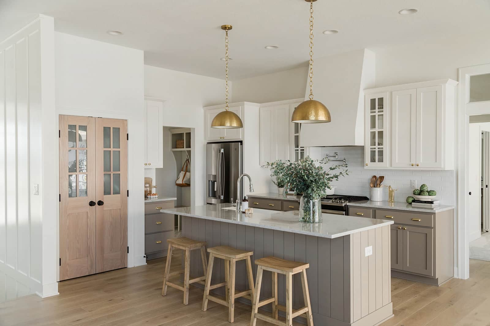 kitchen with large island and 2 pendant lights