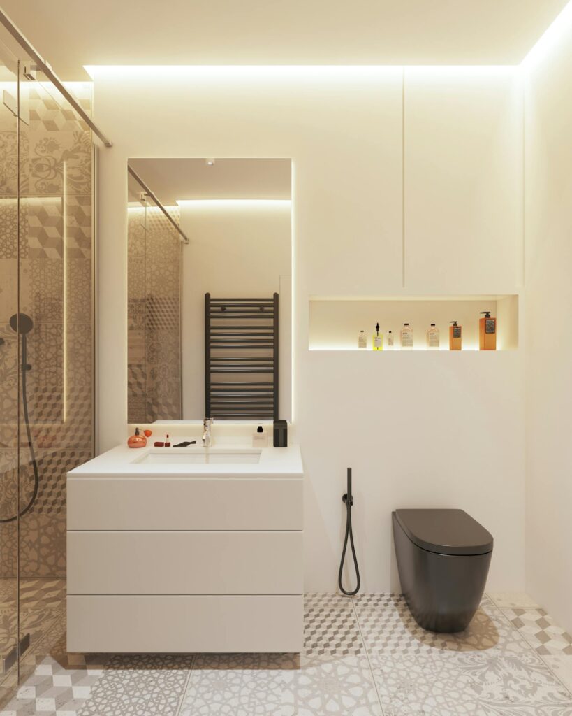 Bathroom Renovation West Vancouver featuring white vanity and black wall-mount toilet