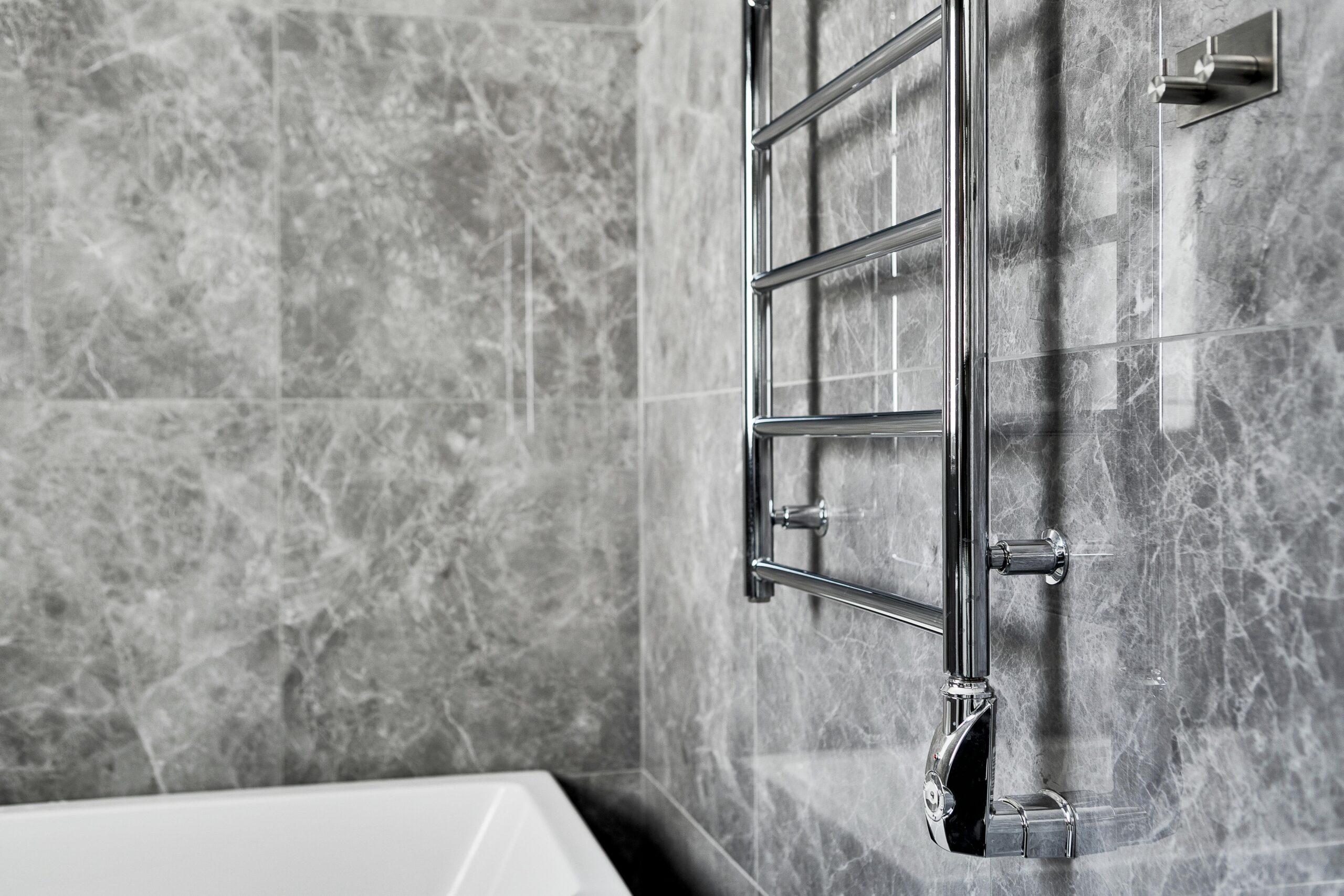 Vancouver Bathroom Renovation with gray tiles and heated towel rack