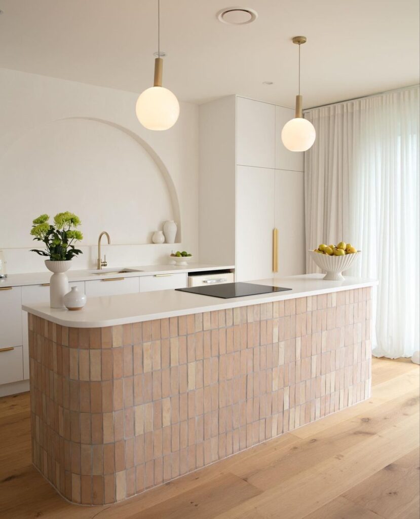 Mediterranean Kitchen with pink tiled island