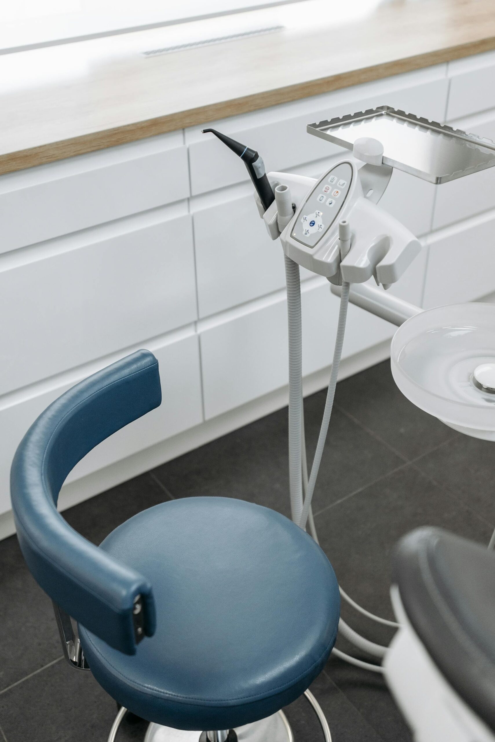Dental office with custom white clinical cabinets