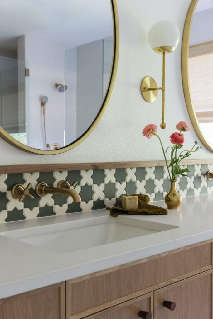 Bathroom renovation Vancouver featuring luxury tile work and contemporary fixtures within typical budget range