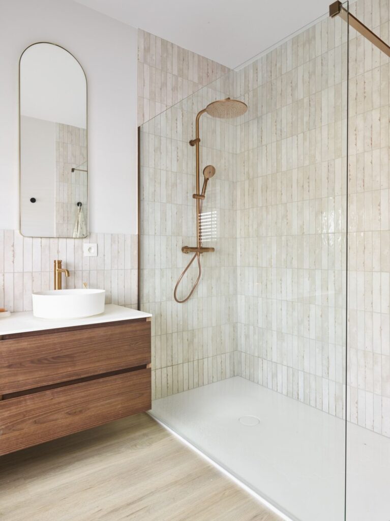 Modern floating vanity in small Vancouver bathroom renovation with under-cabinet lighting