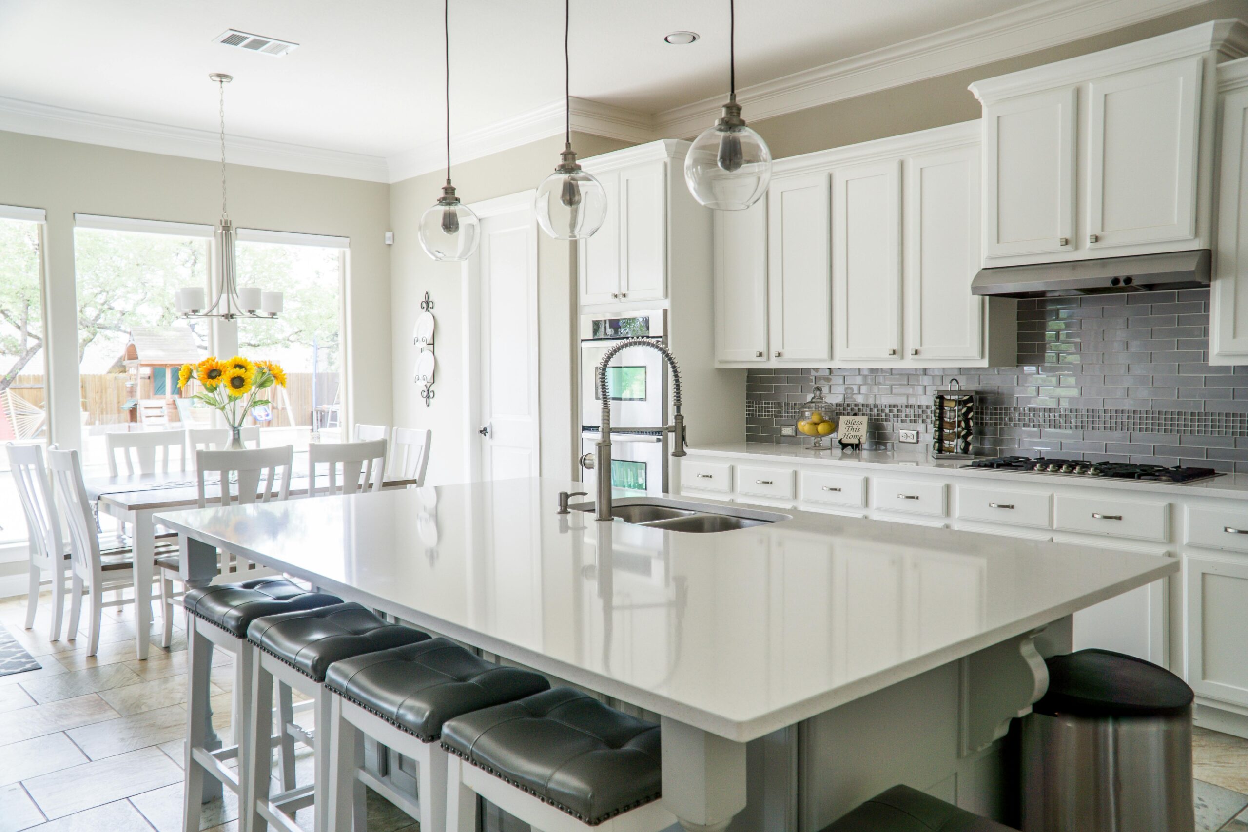 Modern Vancouver kitchen renovation showing white cabinets and quartz countertops