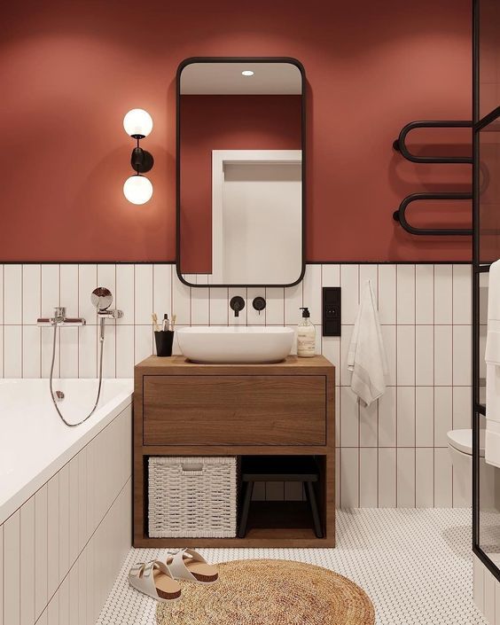 Vancouver bathroom with red wall and white subway tiles