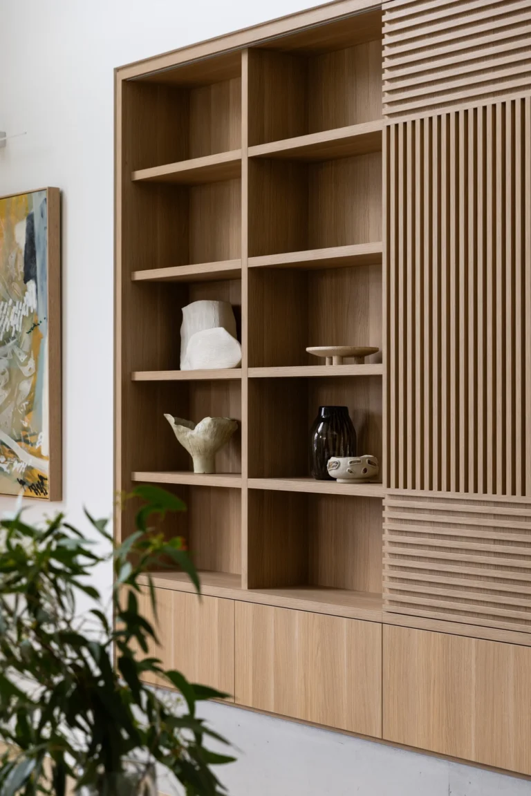 Modern custom light oak cabinetry and built-in shelving designed by QUAY Construction for a home renovation project in Caulfeild, West Vancouver