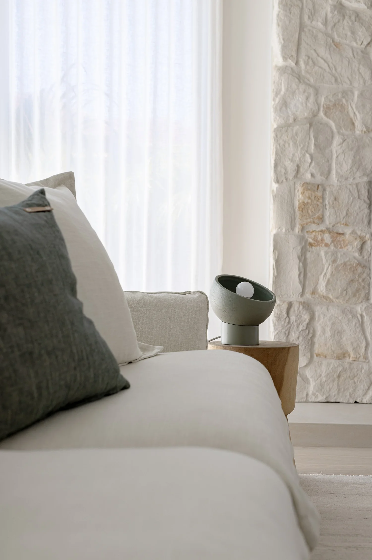 Luxury home renovation in Lougheed by Quay Construction featuring an arched pantry doorway, white cabinetry, and zellige tile.