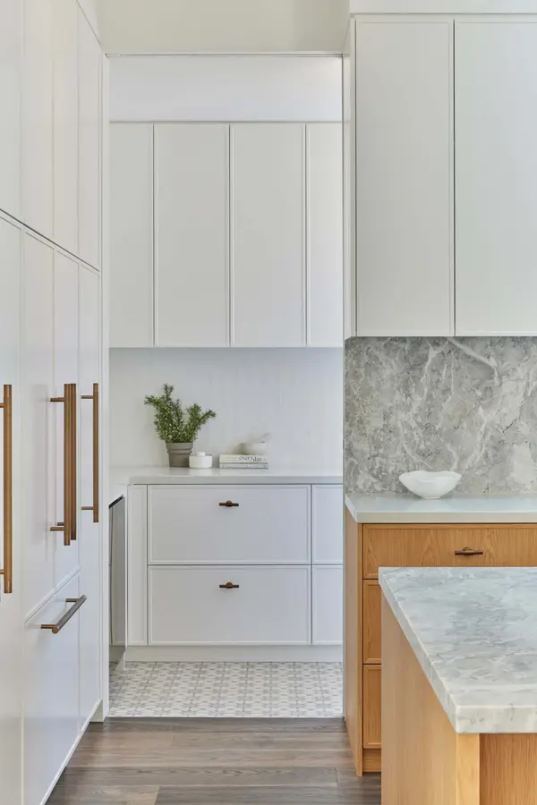 Custom wood cabinetry and modern kitchen detail in a West Vancouver home renovation