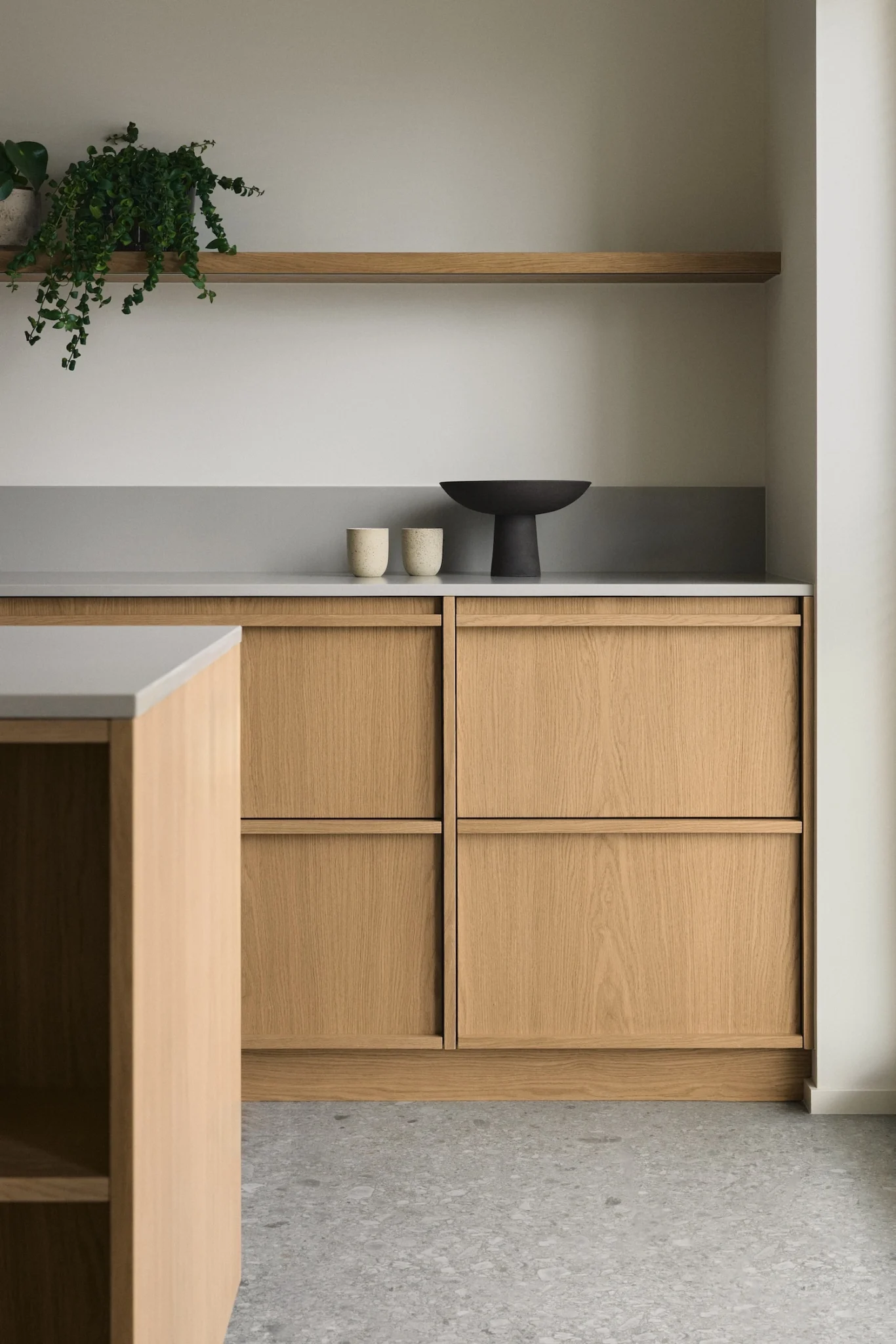 Architectural blueprints and tools for a condo kitchen renovation Vancouver project by QUAY Construction.