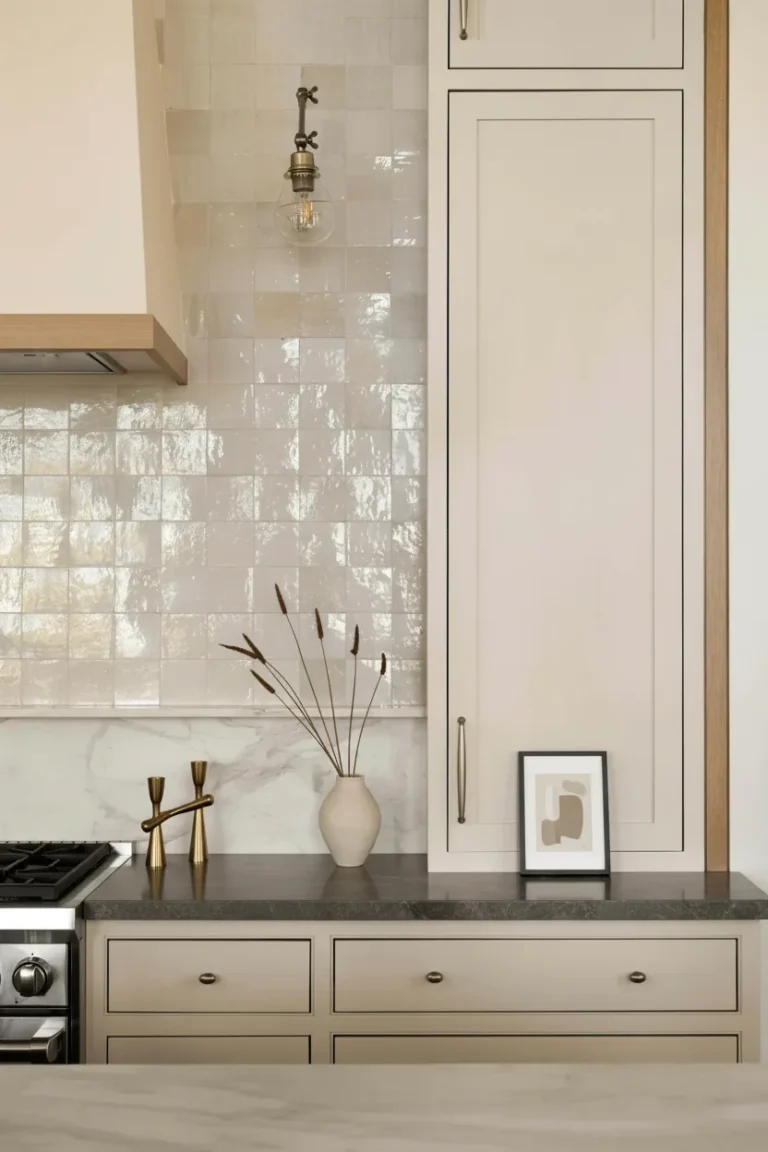 Luxury home renovation in Edgemont Village featuring cream zellige backsplash tiles and custom shaker cabinets.