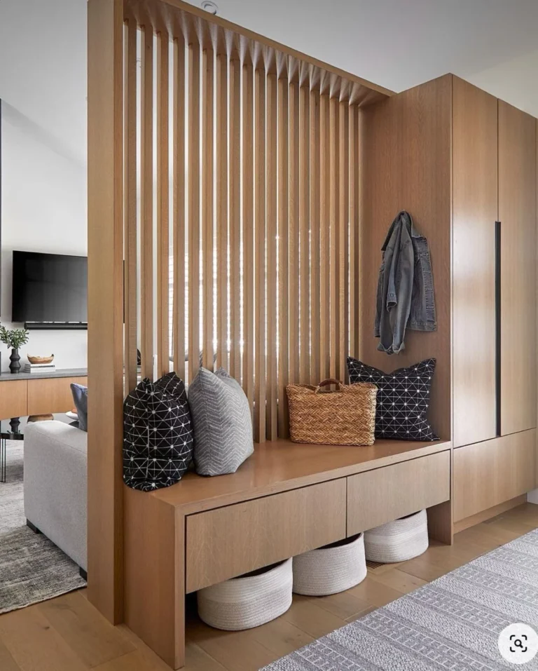 Luxury custom millwork and wood slat feature wall in a high-end Vancouver condo renovation