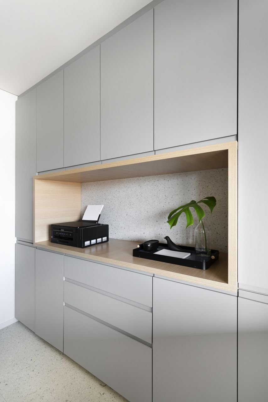 Modern office storage and custom built-in cabinetry for workplace organization