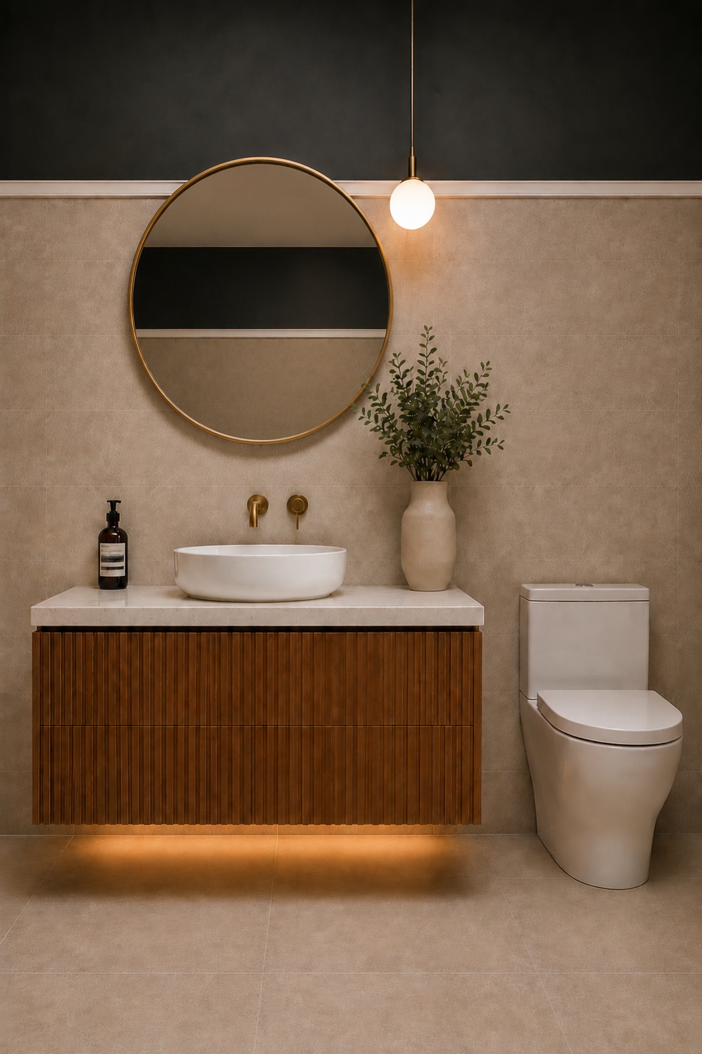 Freestanding bathtub and walk-in glass shower with warm stone tile and brushed brass bathroom fixtures in Downtown Vancouver