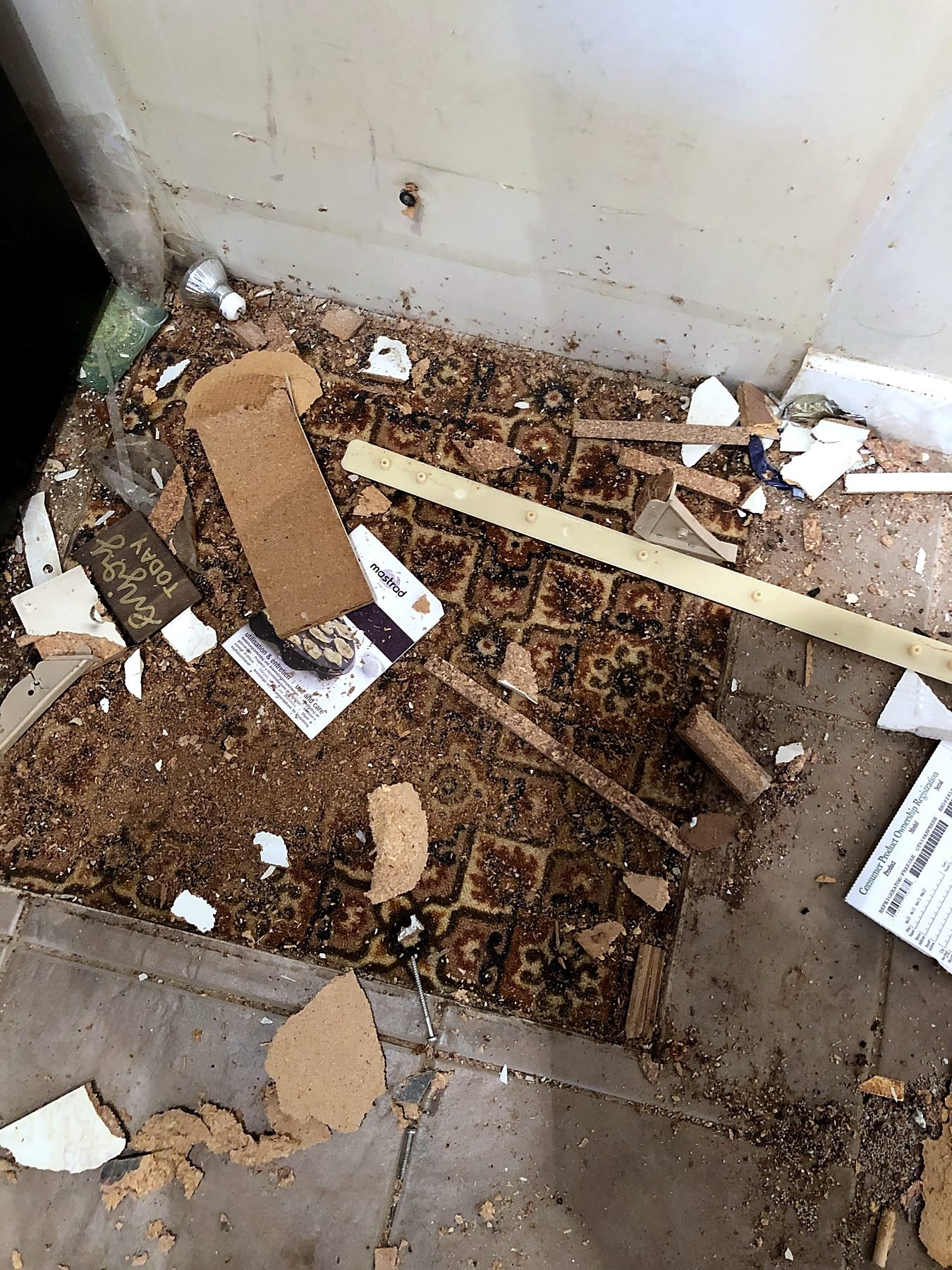 Old carpet and flooring removed during demolition