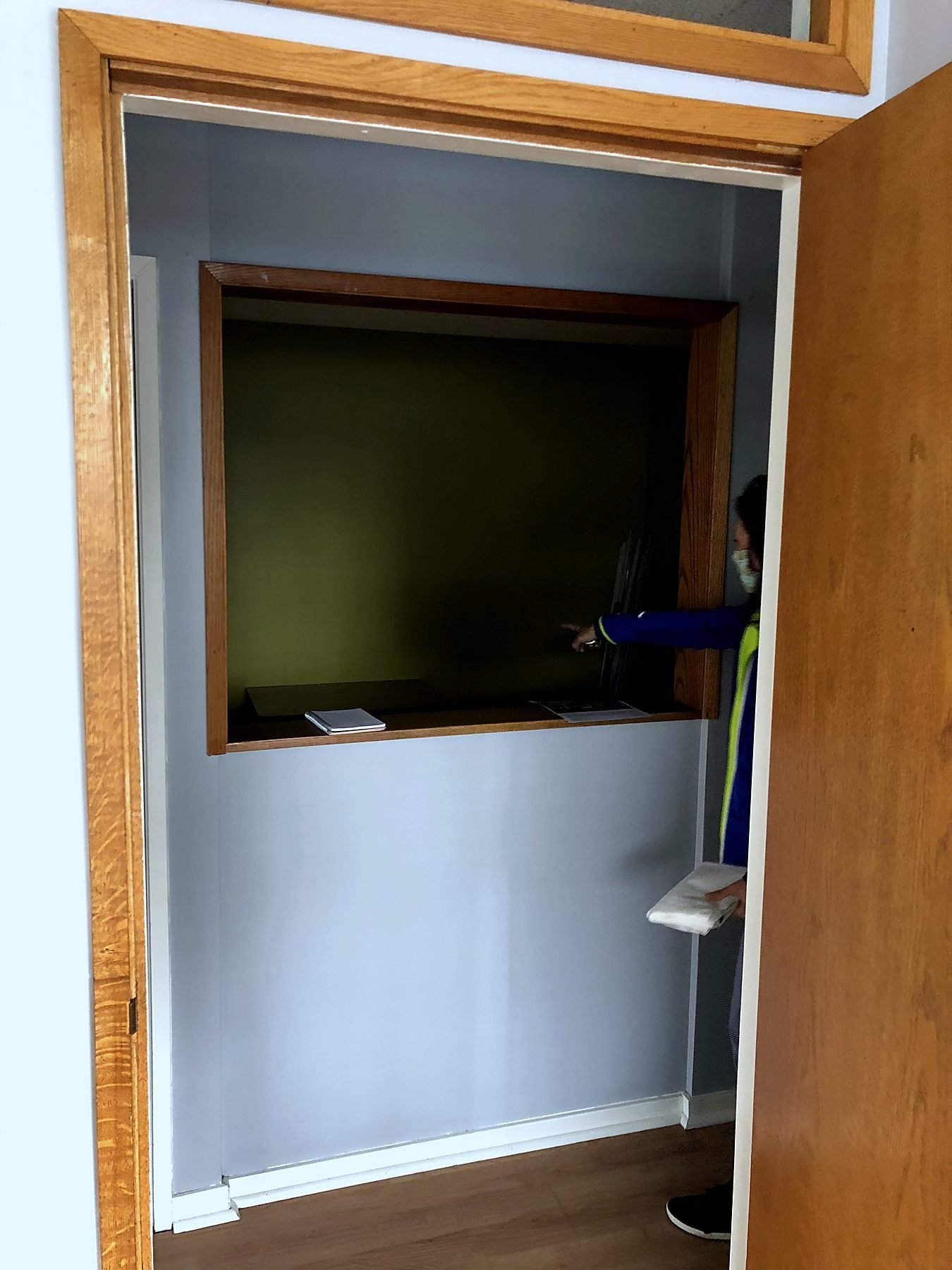 Interior window opening being framed for a new sliding window during the office renovation