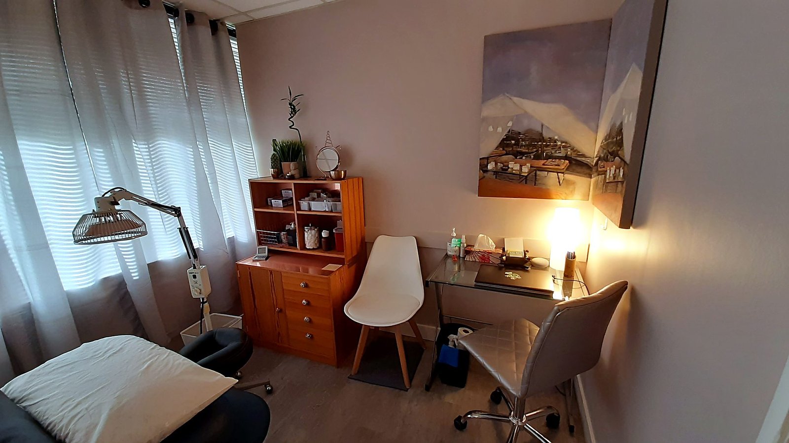 Chiropractic treatment room with new flooring and freshly painted walls