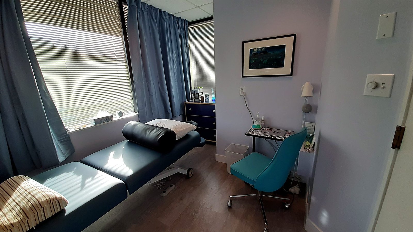 Treatment room with new flooring, paint and finishing carpentry