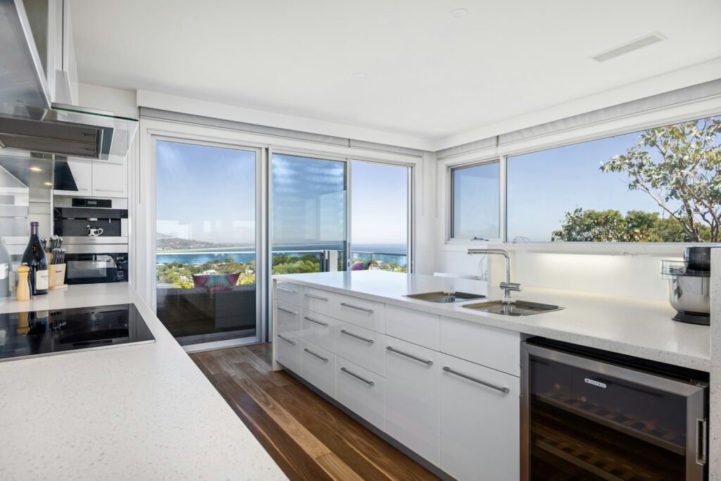 Coastal kitchen with window and natural light