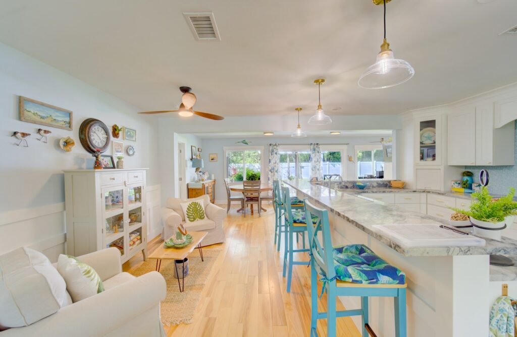Kitchen and living room with relaxed coastal styling