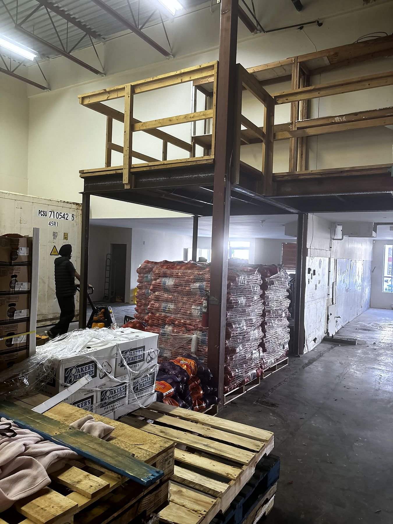 Steel storage mezzanine in a Delta warehouse before demolition