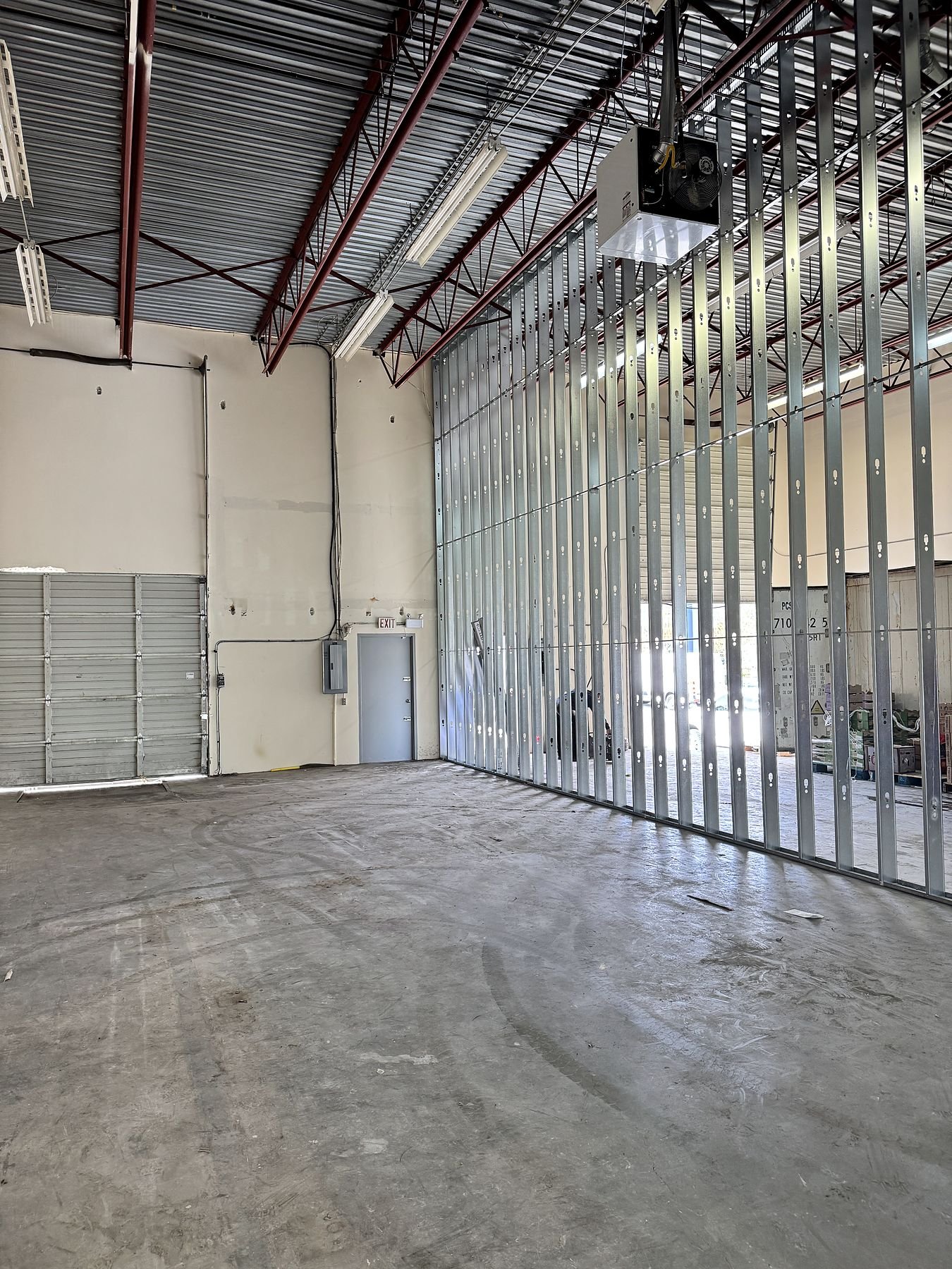 Steel stud framing for a 50-foot warehouse demising wall