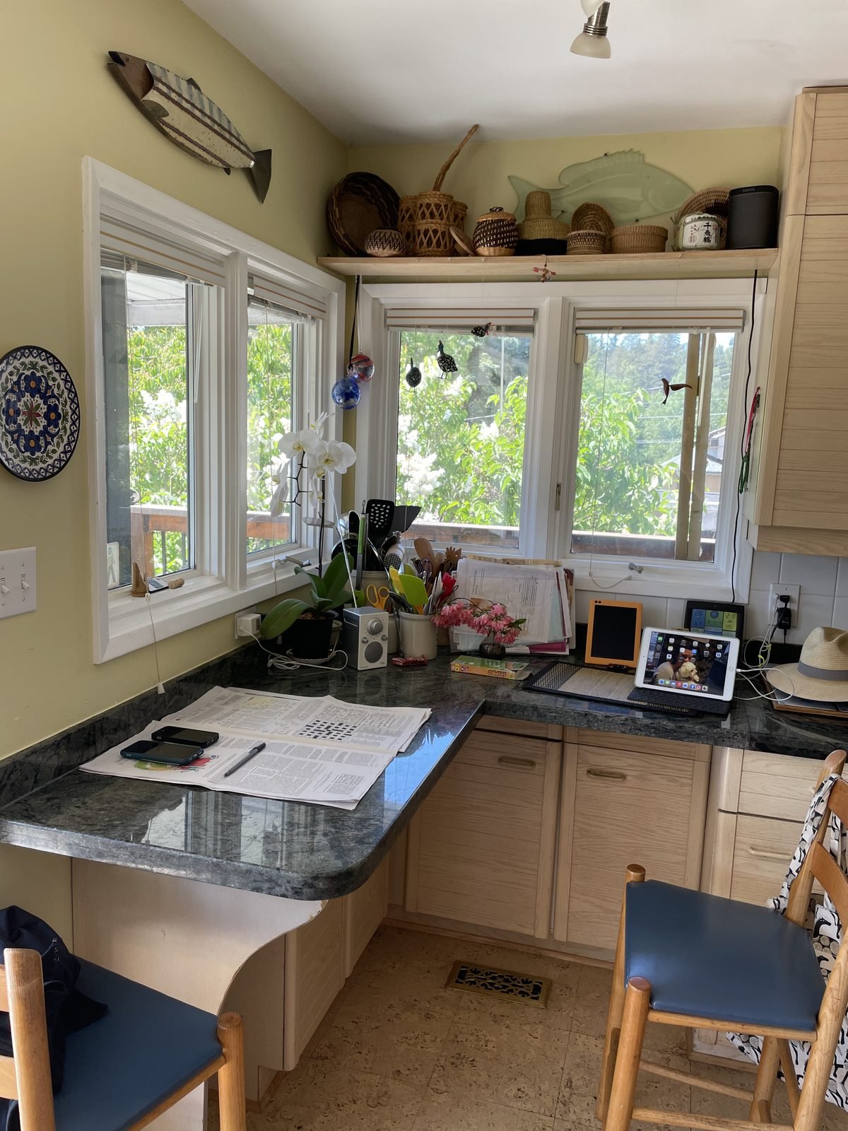 Before: corner window desk with black granite in a Dunbar, Vancouver kitchen