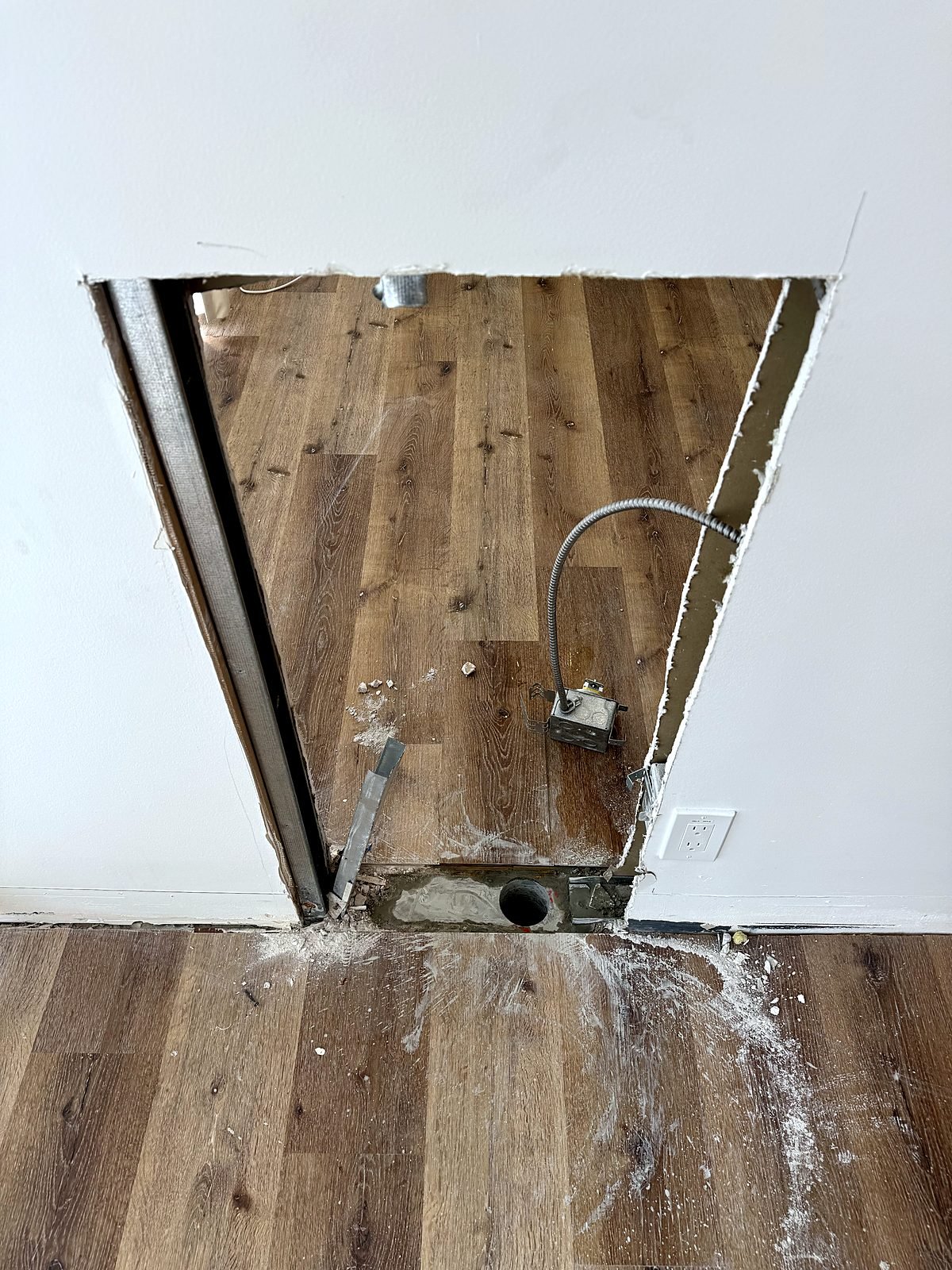 Concrete slab cored for a new sink drain during the clinic tenant improvement