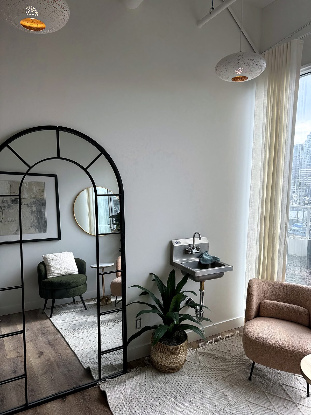 Treatment room with a new wall-mount sink in a False Creek health clinic