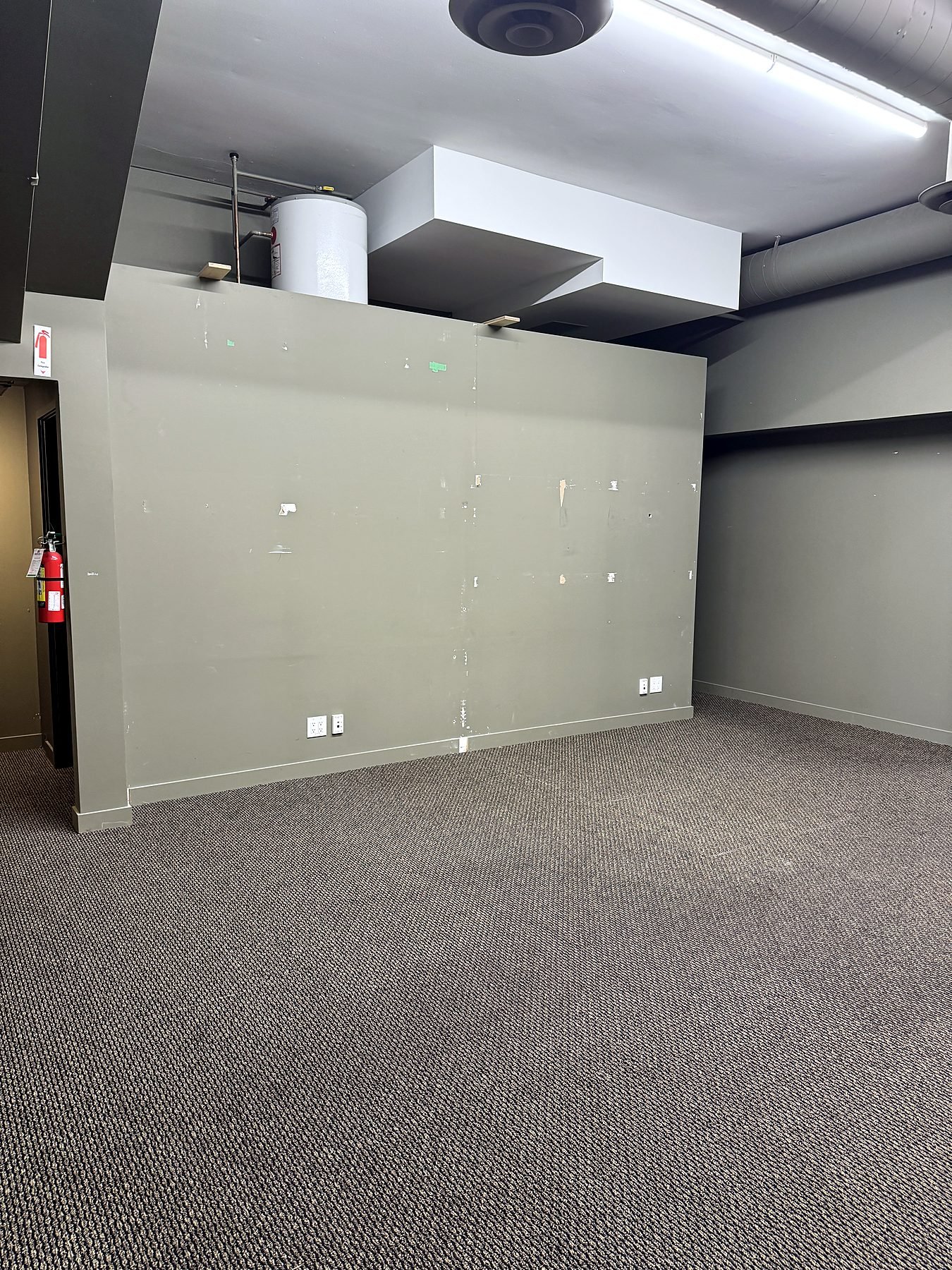 Main floor of the Burnaby office before renovation, where the new staff kitchen was built