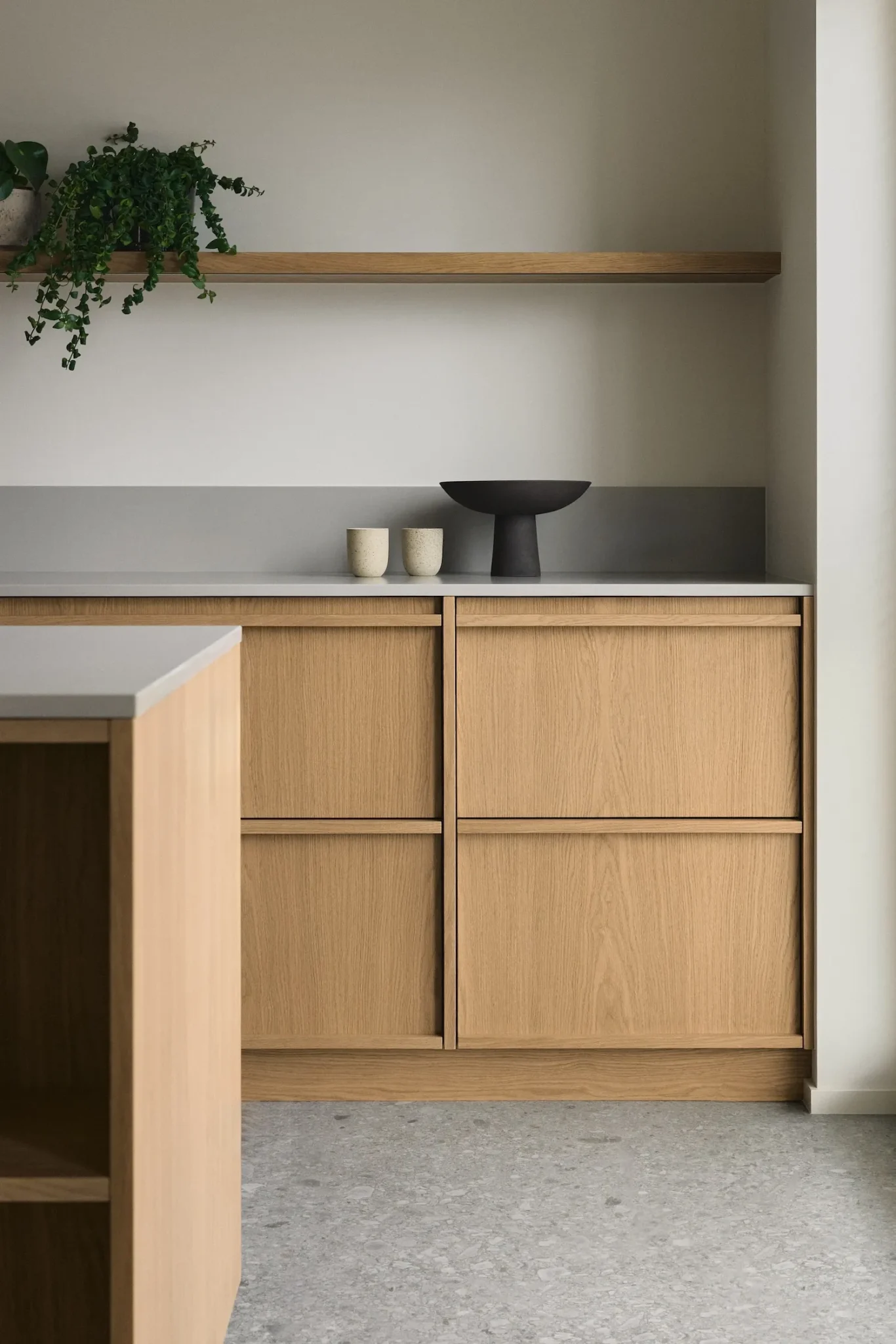 Architectural blueprints and tools for a condo kitchen renovation Vancouver project by QUAY Construction.