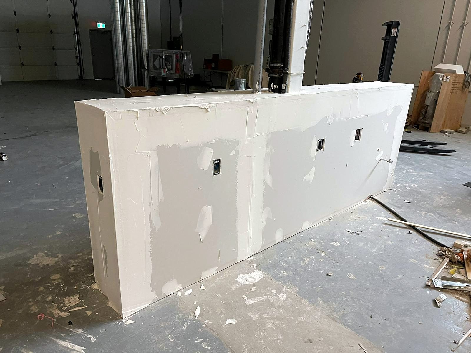 Drywalled pony wall ready for hand sinks on the production floor