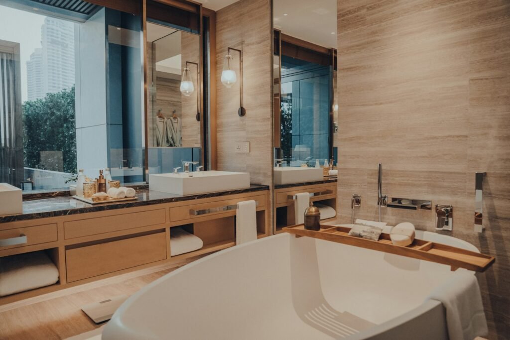 Bathroom with large soaking tub beside a window