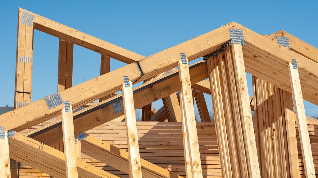 Prefabricated wooden roof trusses installed on a residential house