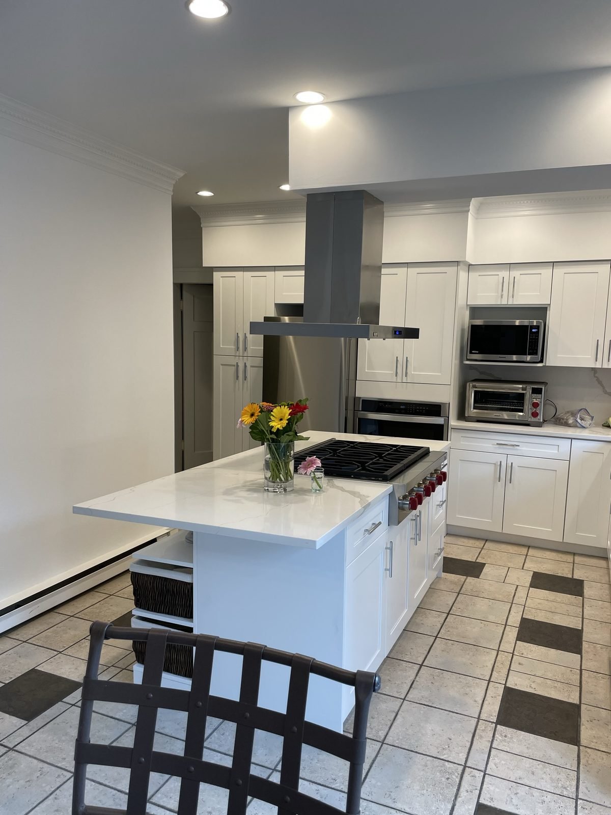 Island end with open shelves and drawer storage in a custom Shaughnessy kitchen renovation