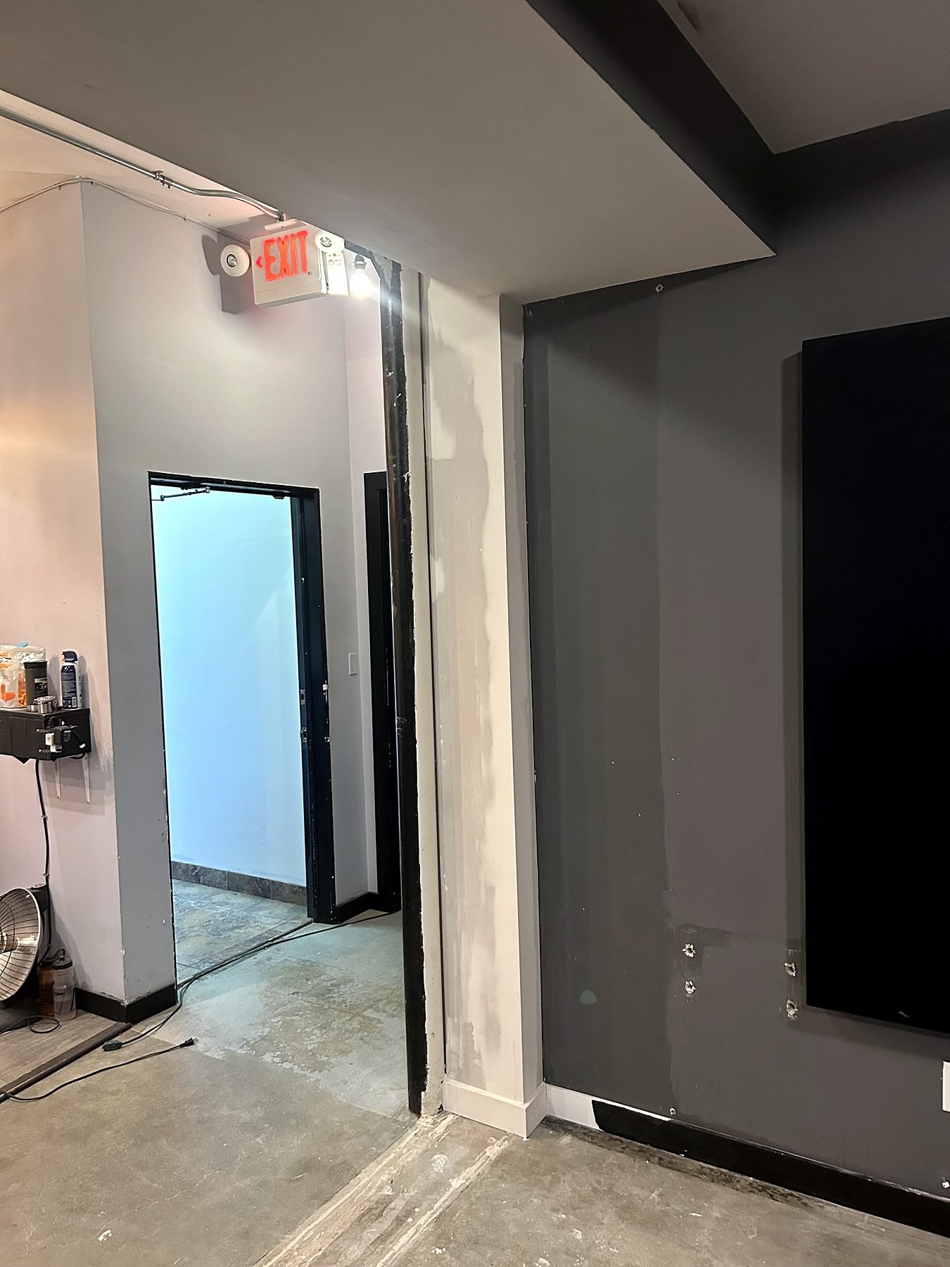Former location of a soundproof partition wall in a Vancouver rehearsal studio, patched and ready for paint