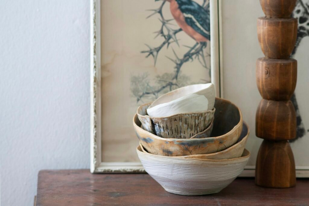 Handmade ceramics on a wooden table, wabi-sabi style